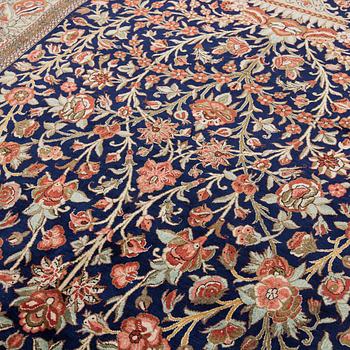 A SILK QUM RUG, ca 222 x 139 cm.