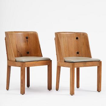 Axel Einar Hjorth, a pair of stained pine "Lovö" armchairs, Nordiska Kompaniet, Sweden, 1930s.
