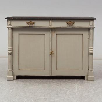 a cabinet from around 1900.