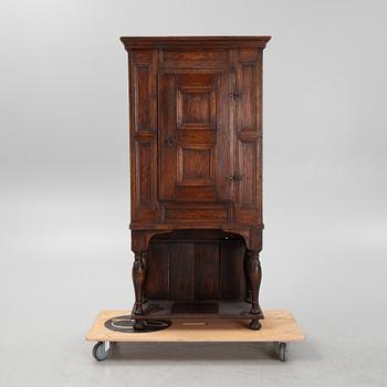 A Baroque cabinet on a later stand, early 18th Century.