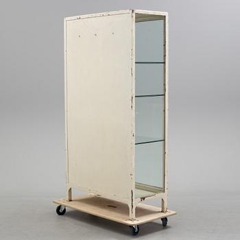 A mid 20th century metal display cabinet.