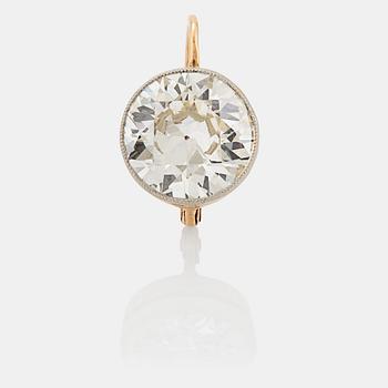 876. An earring in 14K gold and platinum set with an old-cut diamond ca 2.50 cts qulity ca I/J si.