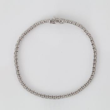 ARMBAND, ett riviére med 62 briljanter, totalt ca 4ct.