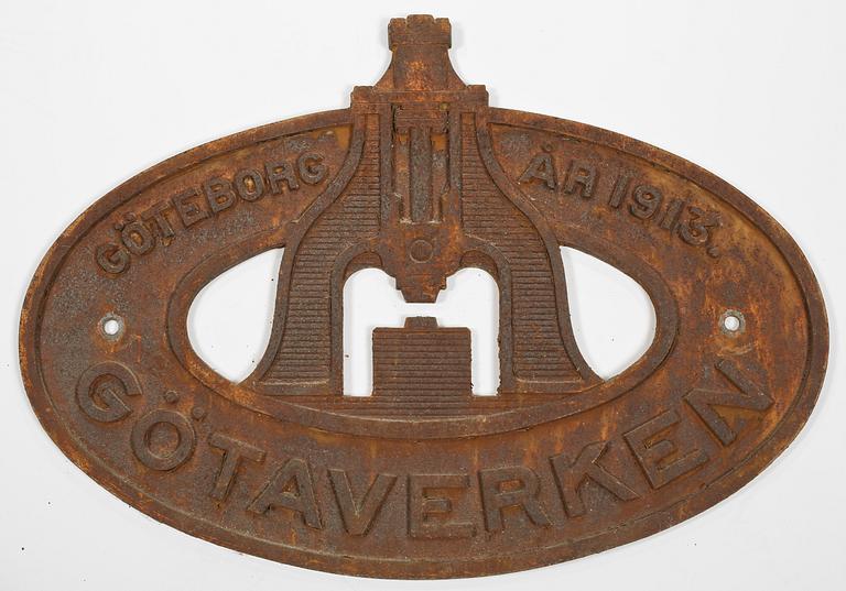 SKYLT, gjutjärn, 1900-talets första hälft.