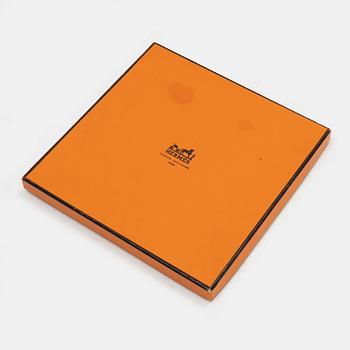 Hermès, a 'Coaching' silk scarf.