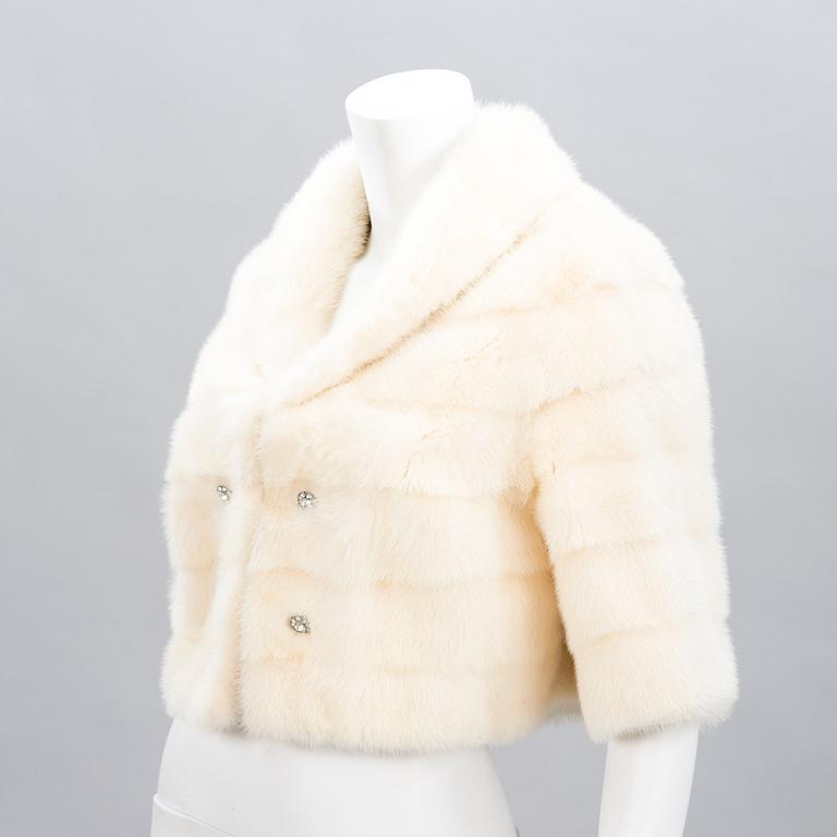 Mink Jacket with a belt and a hat.