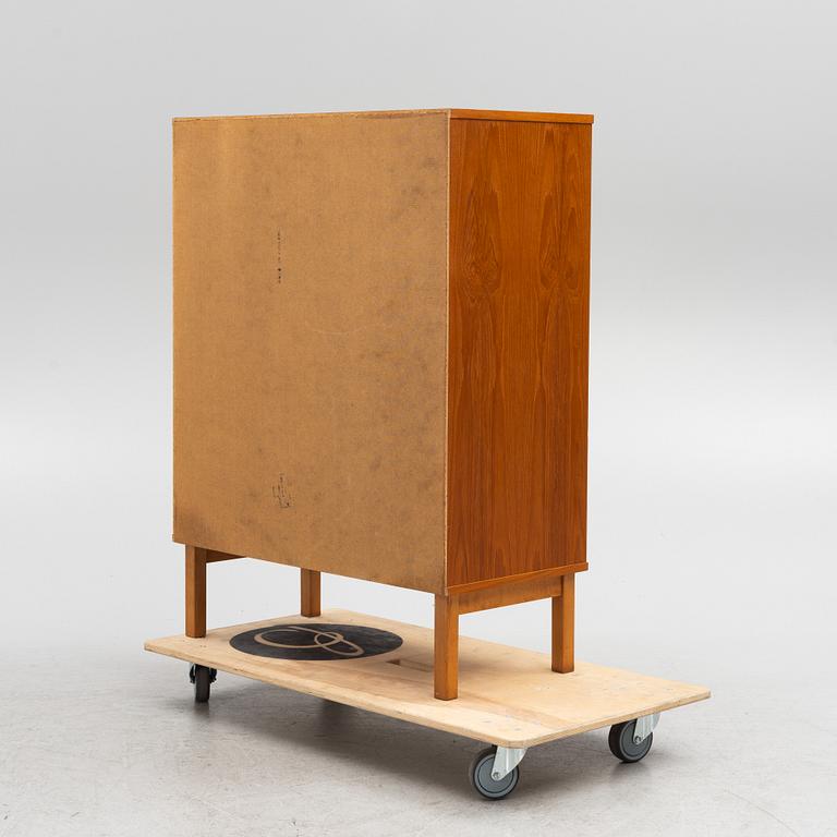 A teak cabinet from Asko, 1950's/60's.