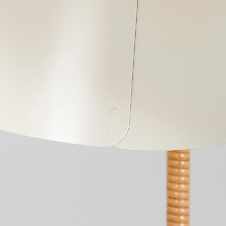 Paavo Tynell, a mid-20th century K10-10 floor lamp for Taito.