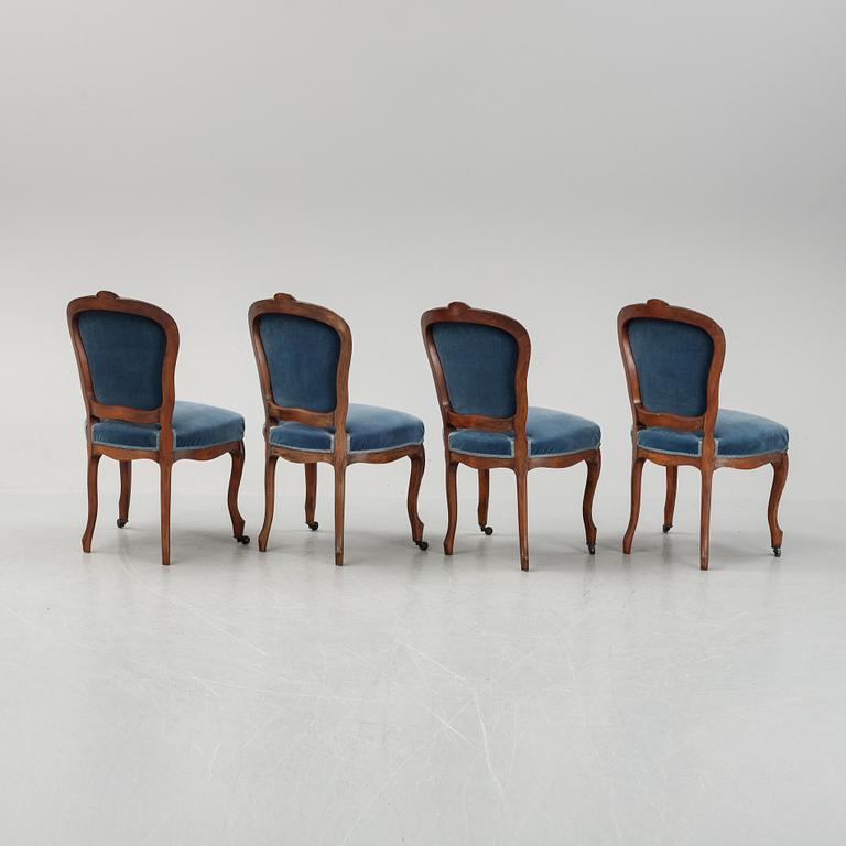 A sofa and a set of four chairs, Rococo revival, late 19th century.