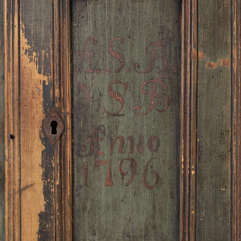 A wall-hanged cabinet, Sweden, dated 1796.