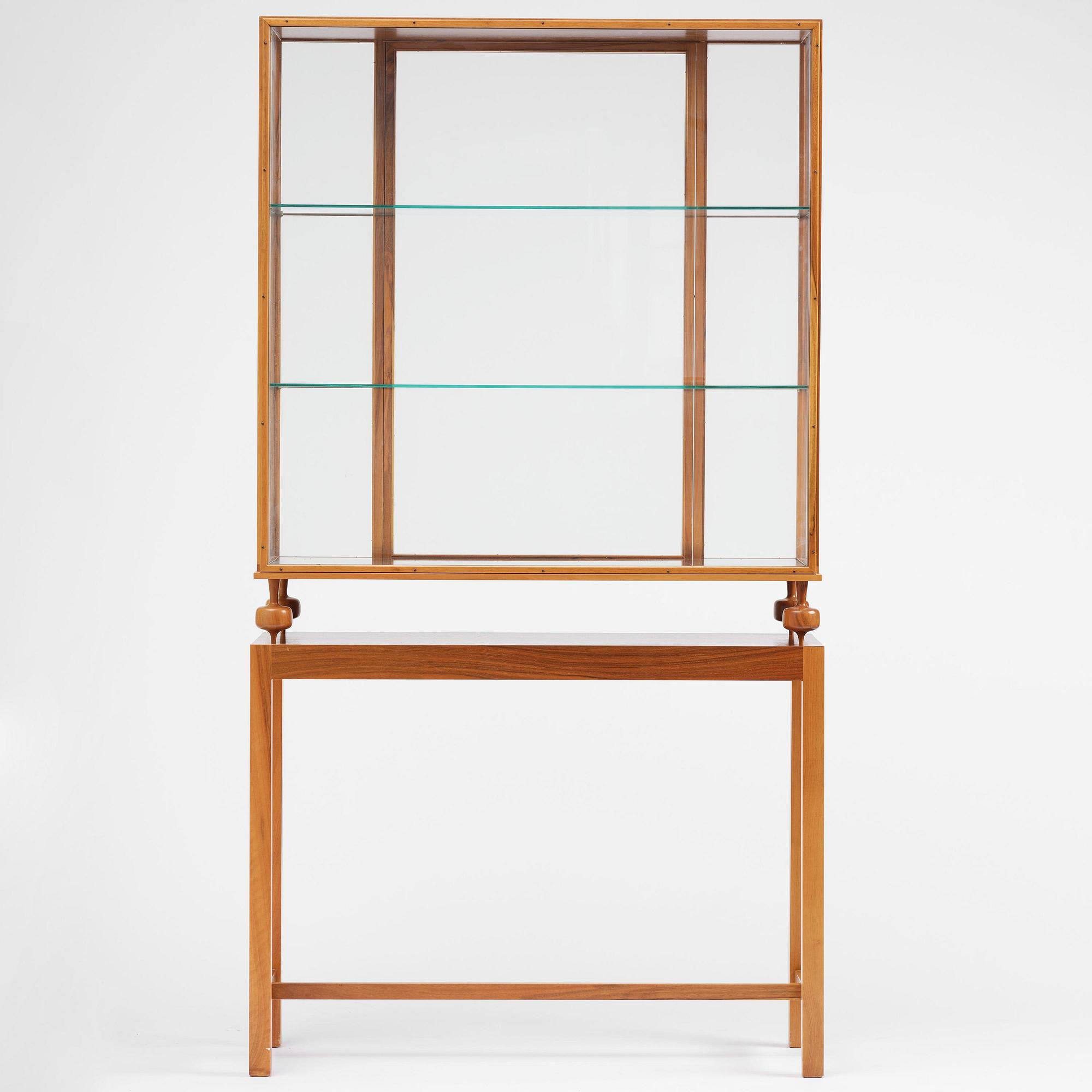 Josef Frank, a walnut showcase cabinet model "B 2077", Firma Svenskt Tenn.