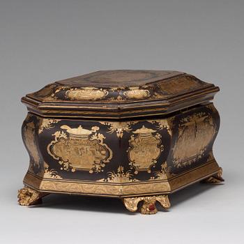 A lacquered tea box with pewter canisters, Qing dynasty, late 19th Century.