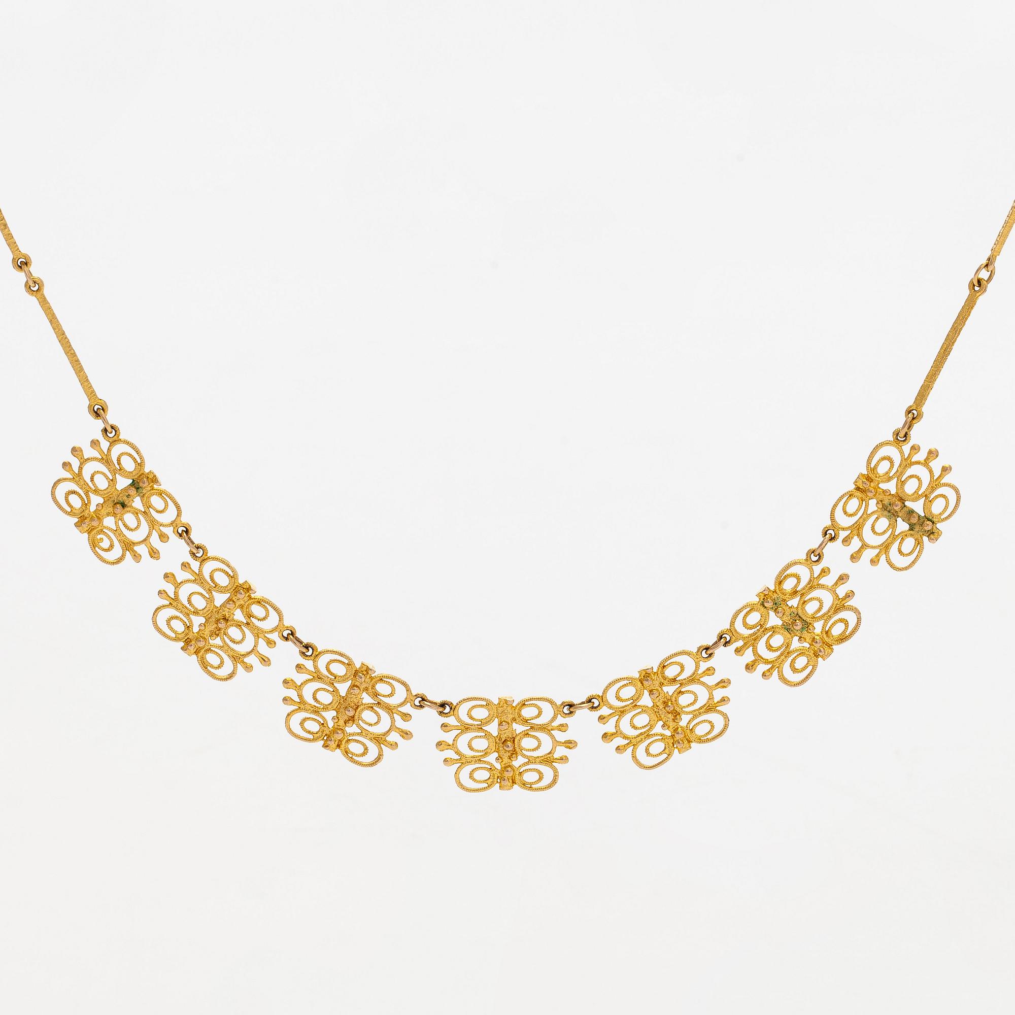 Esko Raitanen, collier, armband och örhängen, 14K guld, Helsingfors 1972.