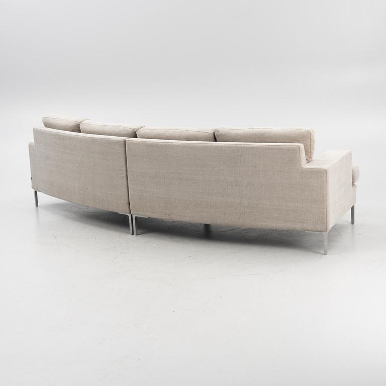 A 'Curve' sofa with a foot stool, Ire, 21st Century.