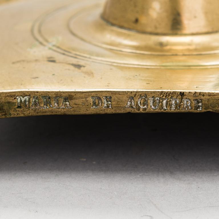 A late 17th century Spanish brass candlestick.