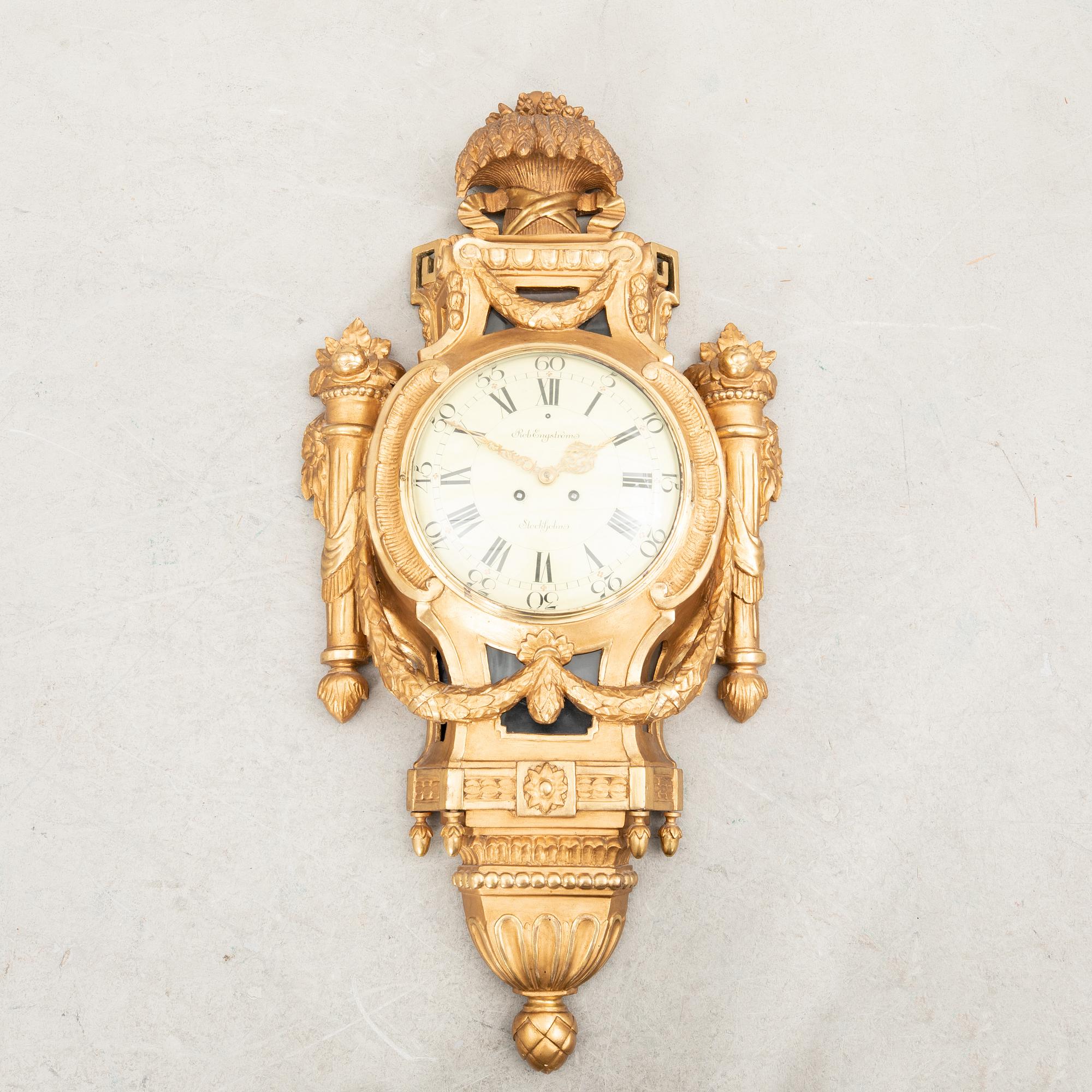 Wall clock in the Gustavian style, first half of the 20th century.