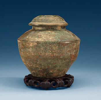 1398. A green glazed jar with cover, Han dynasty (206 BC – 220 AD).