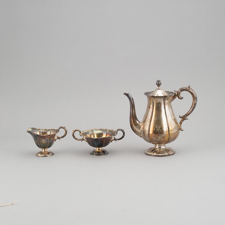 A silver coffee pot, creamer and sugar bowl. Kultakeskus Oy, Hämeenlinna, Finland 1943.