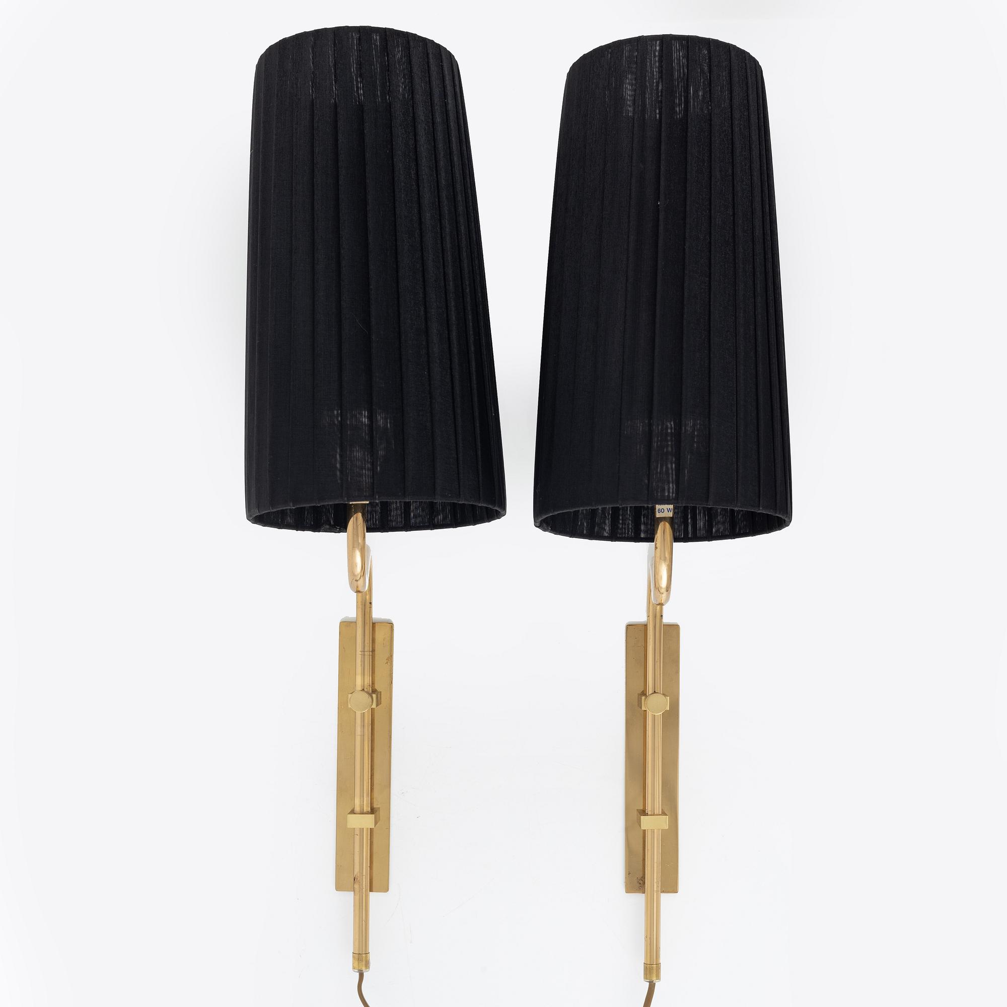 A pair of brass wall lights from Bergboms, second half of the 20th Century. Marked.
