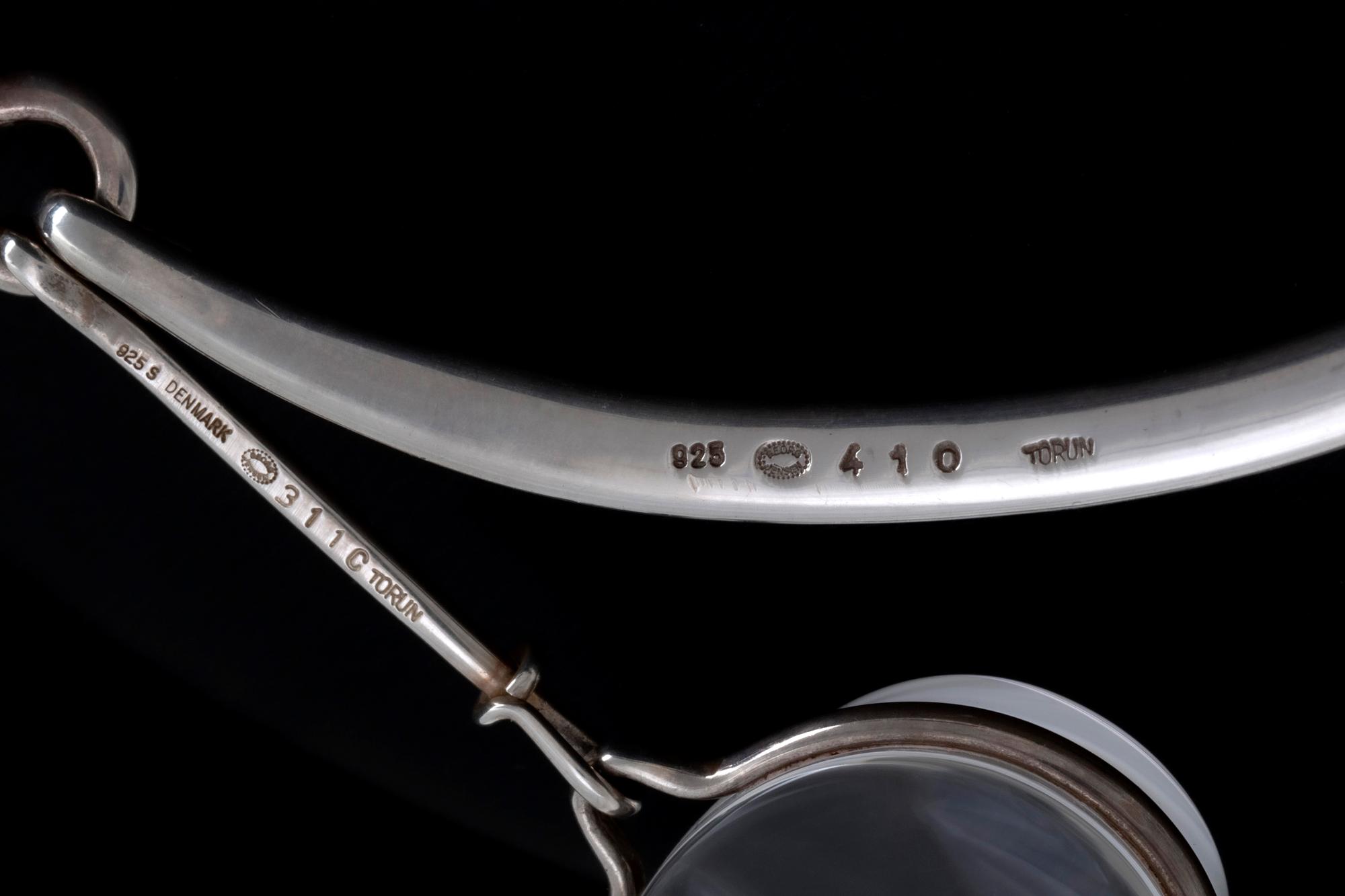 Vivianna Torun Bülow-Hübe. Necklace with pendant, sterling silver and rock crystal or glass.