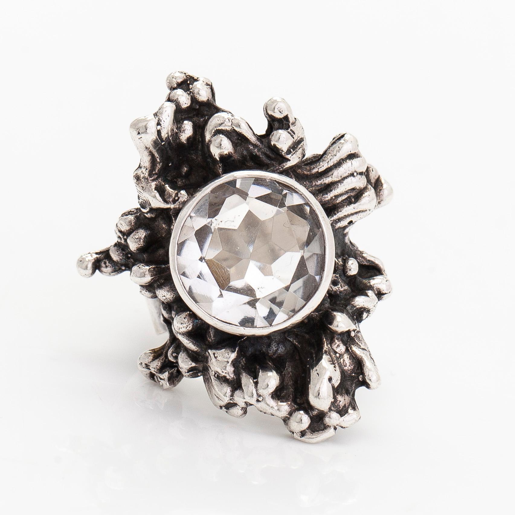 Pentti Sarpaneva, a silver and rock crystal necklace, ring and earrings, Turun Hopea, Turku.