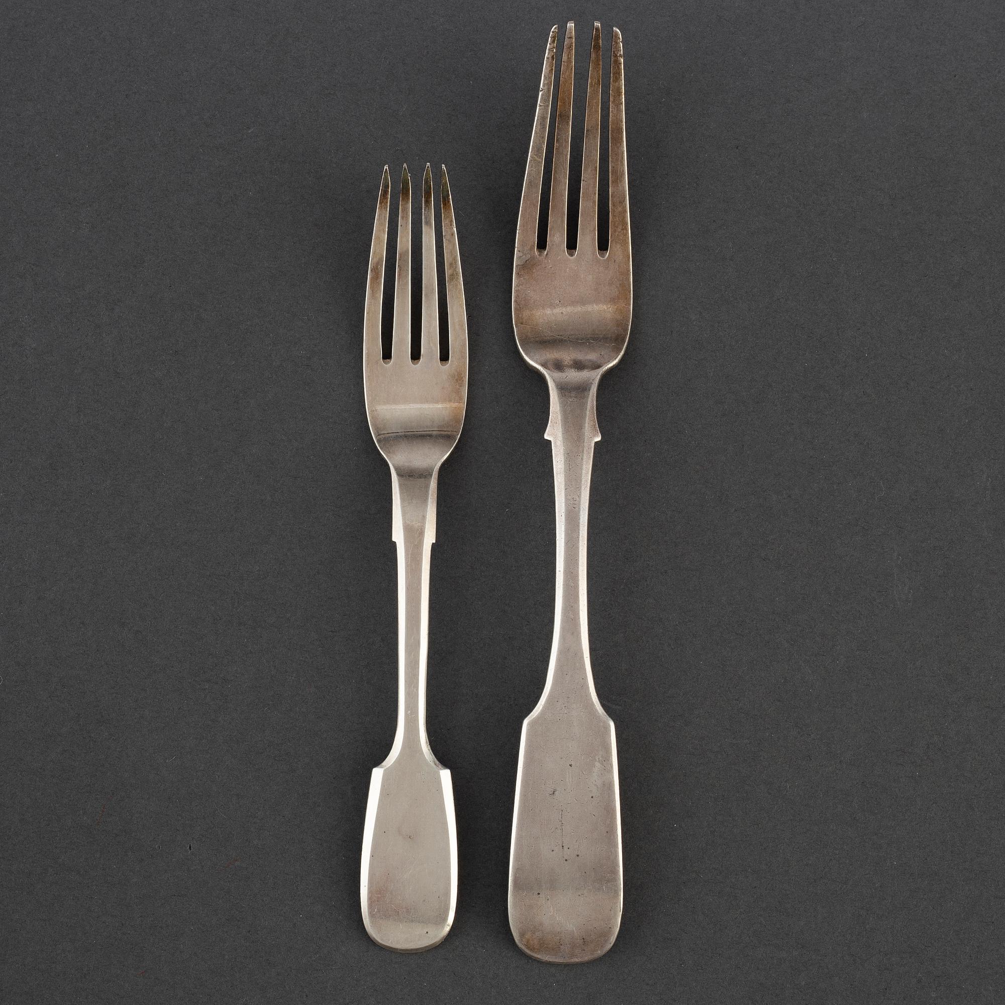 Eightteen Russian19th Century silver forks from various makers.