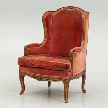 A Rococo style armchair, early 20th Century.