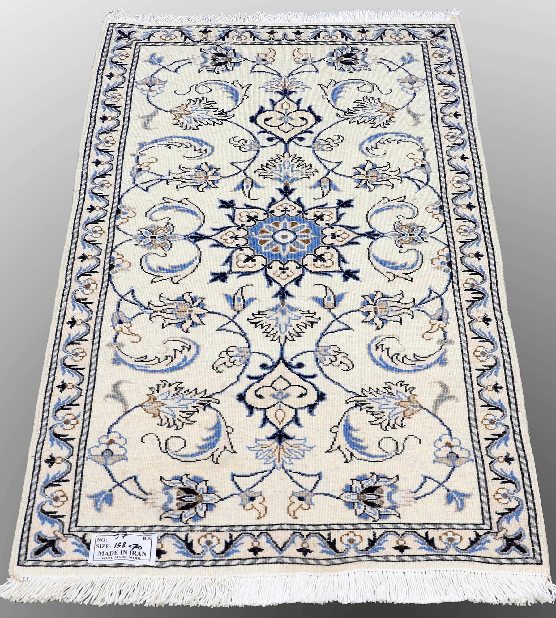 Two Nain rugs, ca 138 x 70 and 140 x 70 cm.