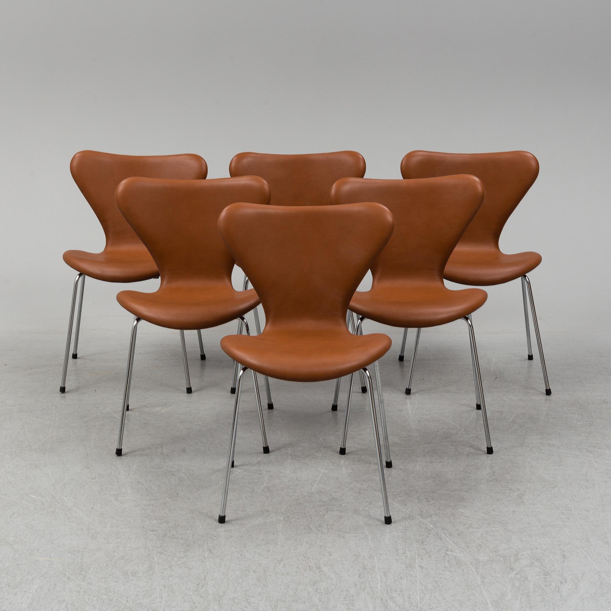 ARNE JACOBSEN, six leather 'Series 7' chairs, Fritz Hansen, Denmark.