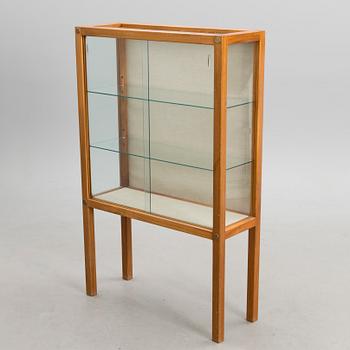 A 1950s display cabinet, 'Näyttely-vitriini' for Huonekalu Mikko Nupponen Oy, Finland.