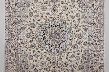 A carpet, Nain, part silk, ca 341 x 245 cm.