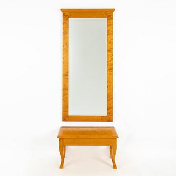 A mirror with console table, early 20th century.