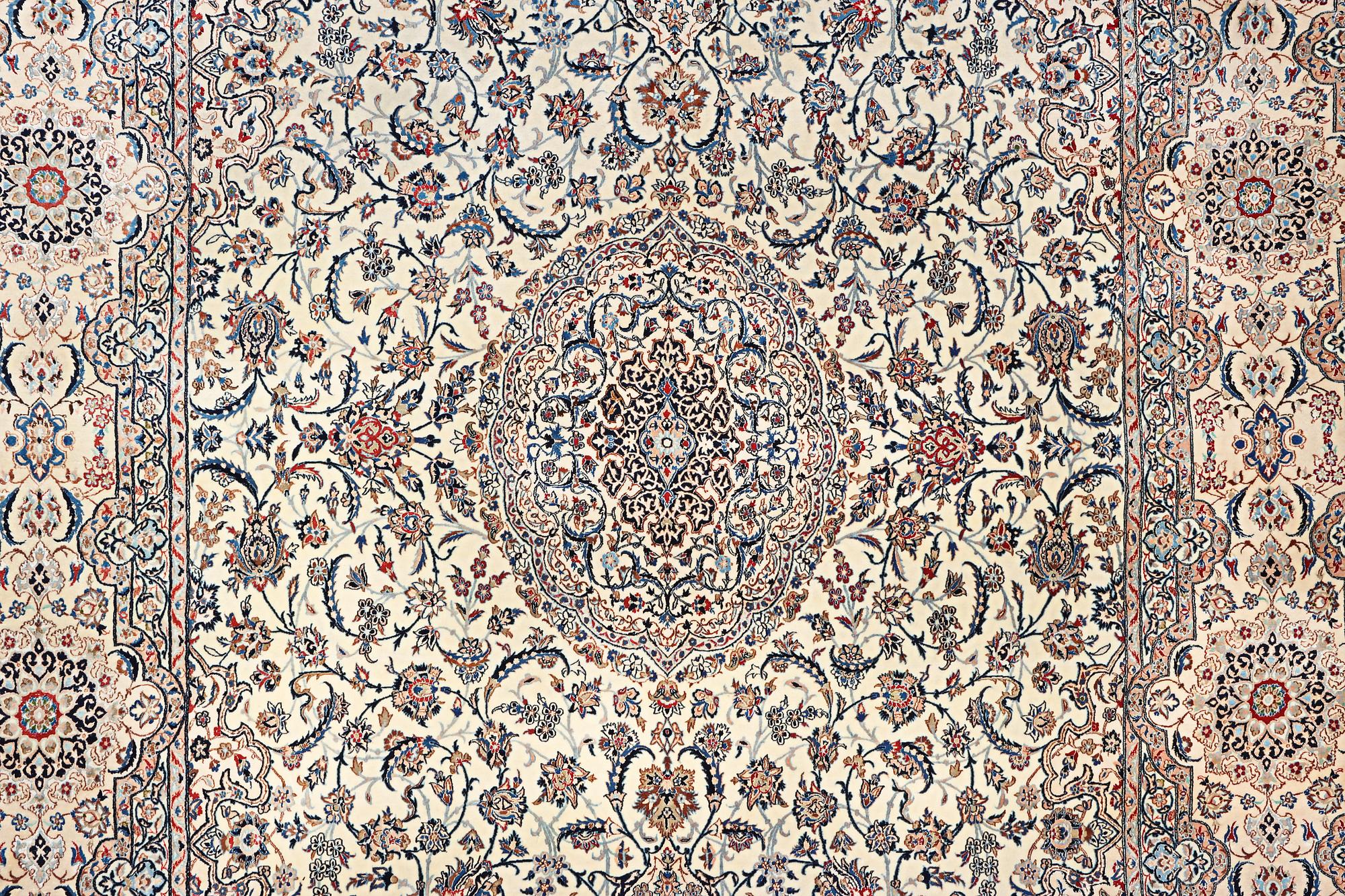 A Nain carpet, part silk, 6 laa, c. 453 x 298 cm.
