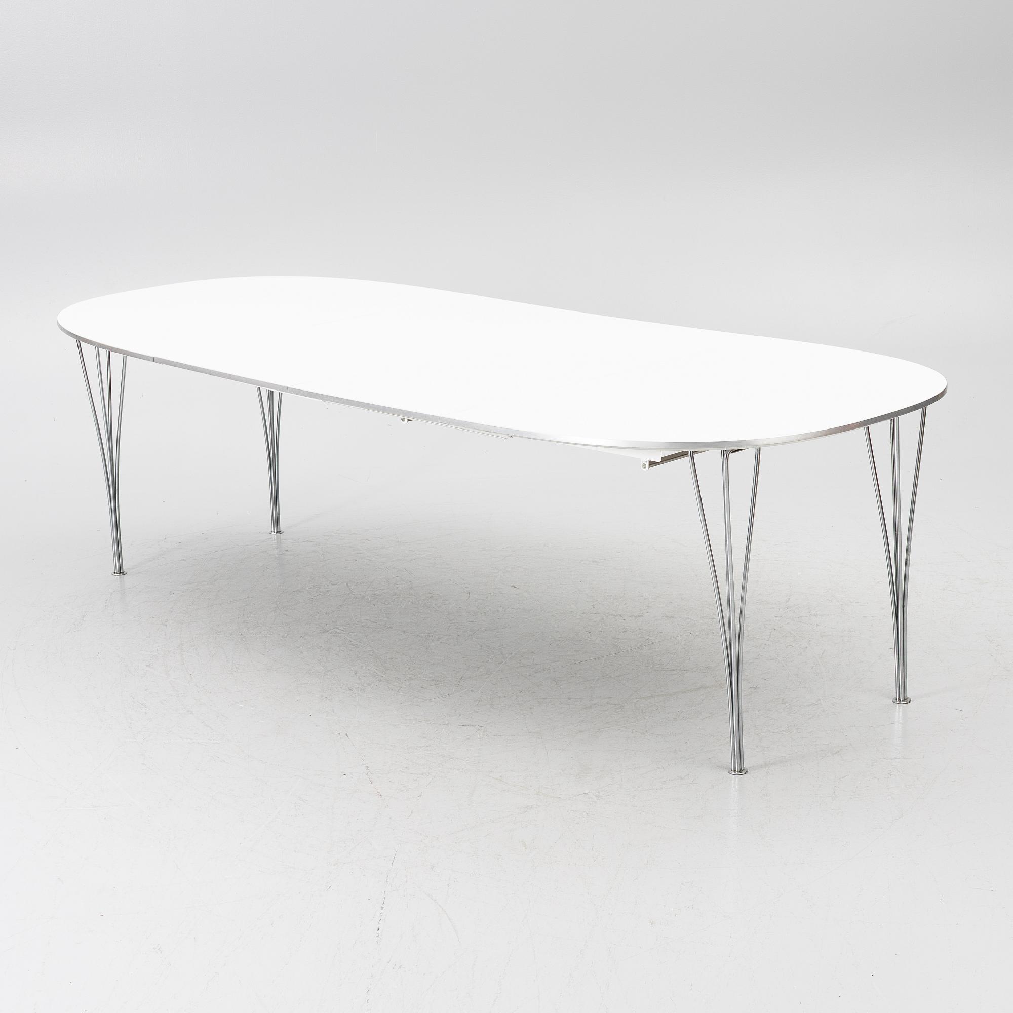Bruno Mathsson, & Piet Hein, dining table, “Superellipse”, Fritz Hansen, 1987.