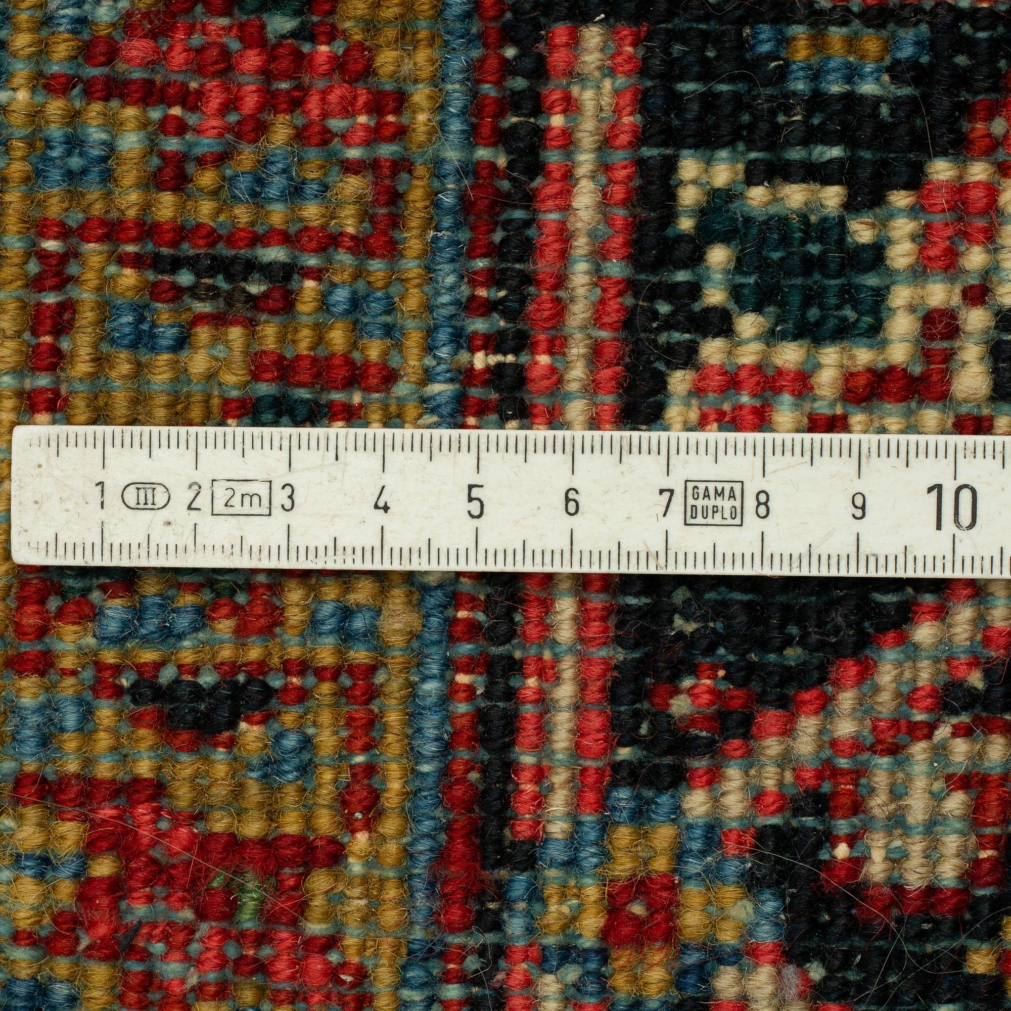 A CARPET, semiantik Heris/Gorovan, ca 353 x 238 cm.