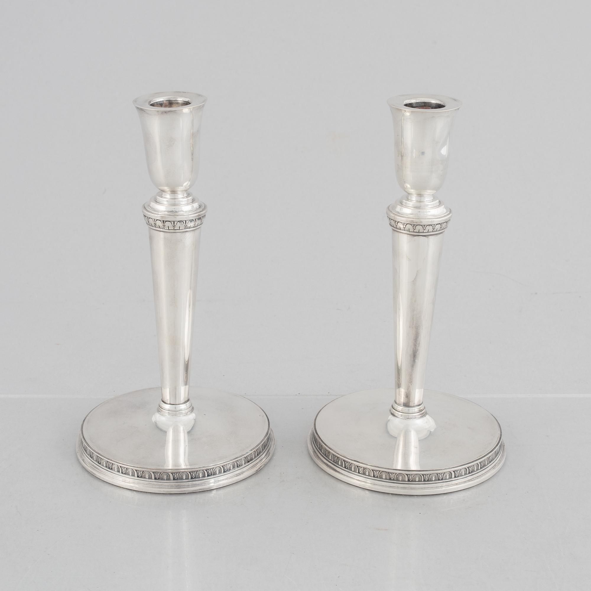 Eric Råström, a pair of silver candlesticks, Råströms Silver- O Nysilverfabrik , Stockholm 1957.