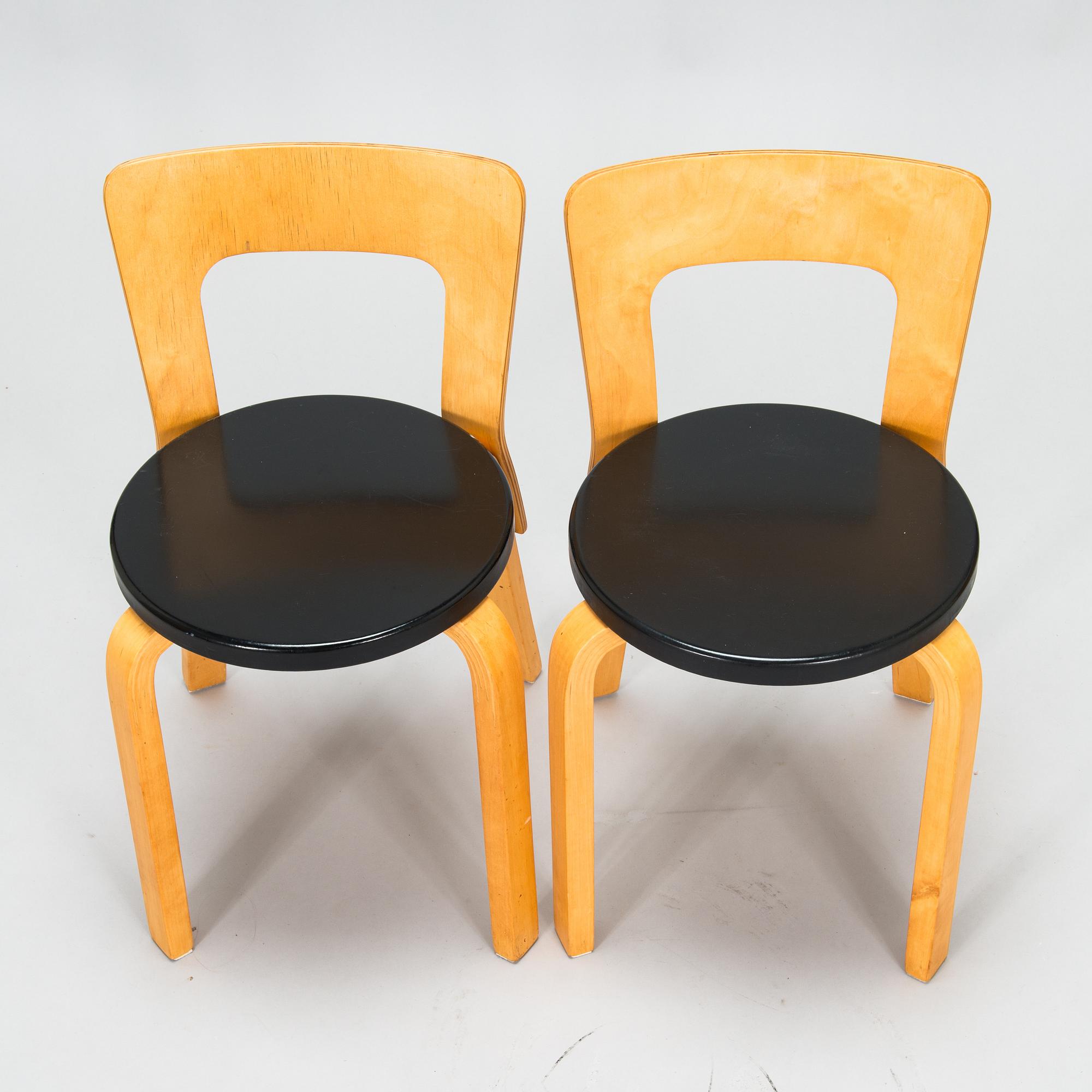 Alvar Aalto, four 1950s chairs, model 65, Artek.