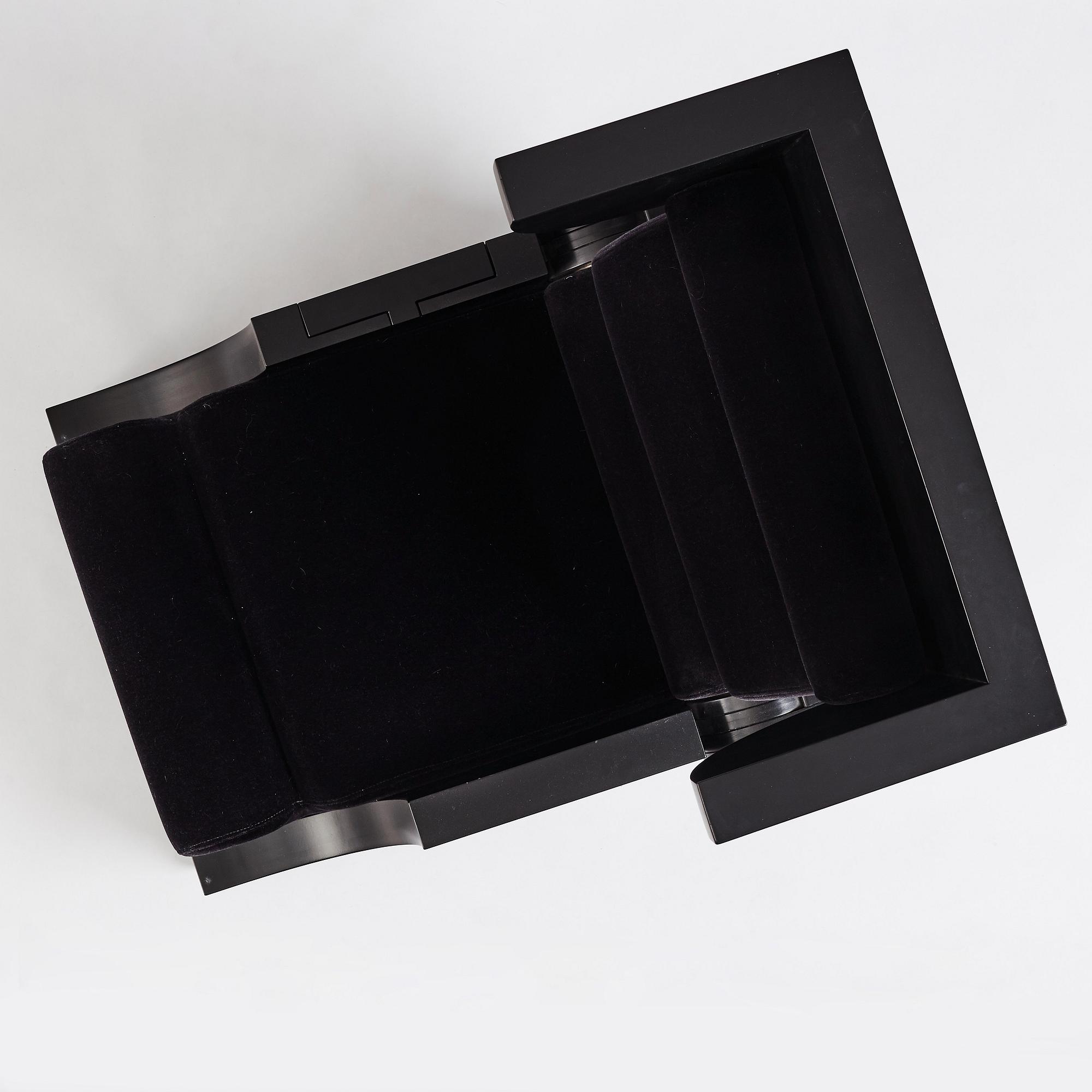 Alexander H Damsbo & Henrik Ingemann Nielsen, a "HC-Andersen Chair" armchair/table, ed. 3/49, Källemo, post 2005.