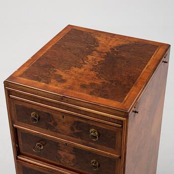 Byrå, England, 1900-tal.