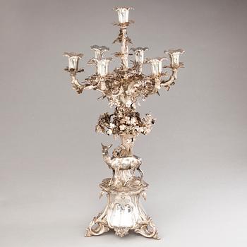 C.G. HALLBERG, A 7-flame silver candelabrum, mark of CG Hallberg Gothenburg, Sweden 1863.