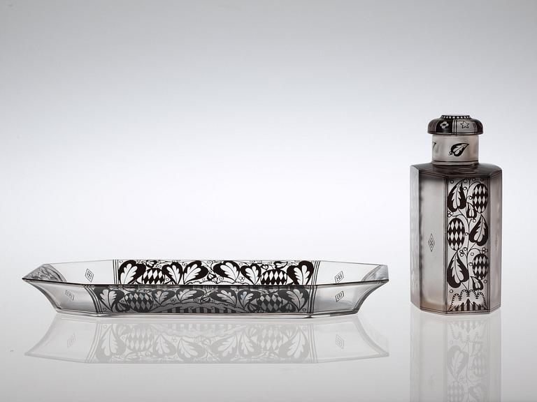 A Josef Hoffmann glass bottle and dish, from a five-piece toilet garniture, 'Achteckig Schwarzbronzit', Vienna 1910's.