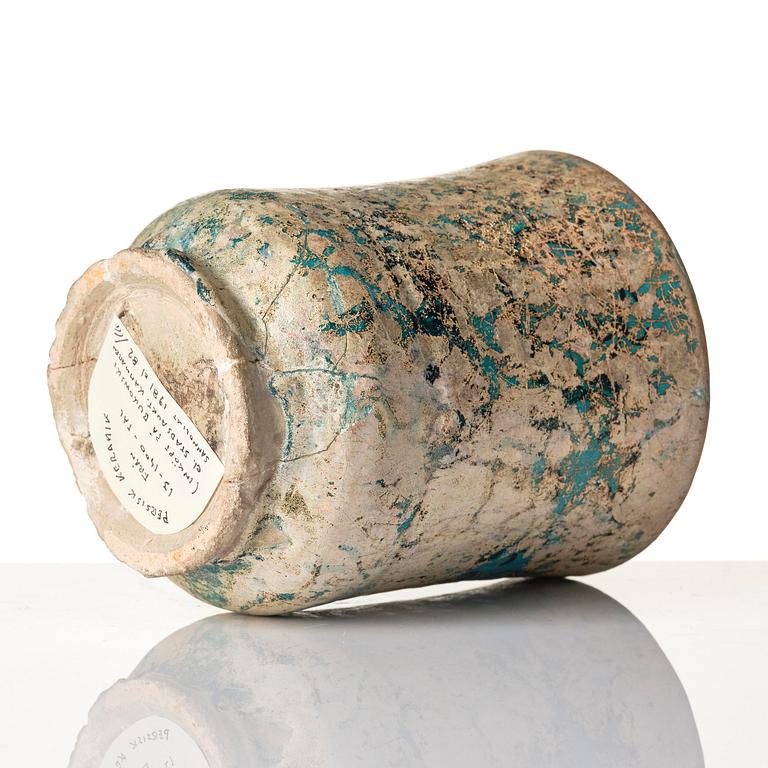 A Kashan pottery jar (Albarello), Persia, 13th century.