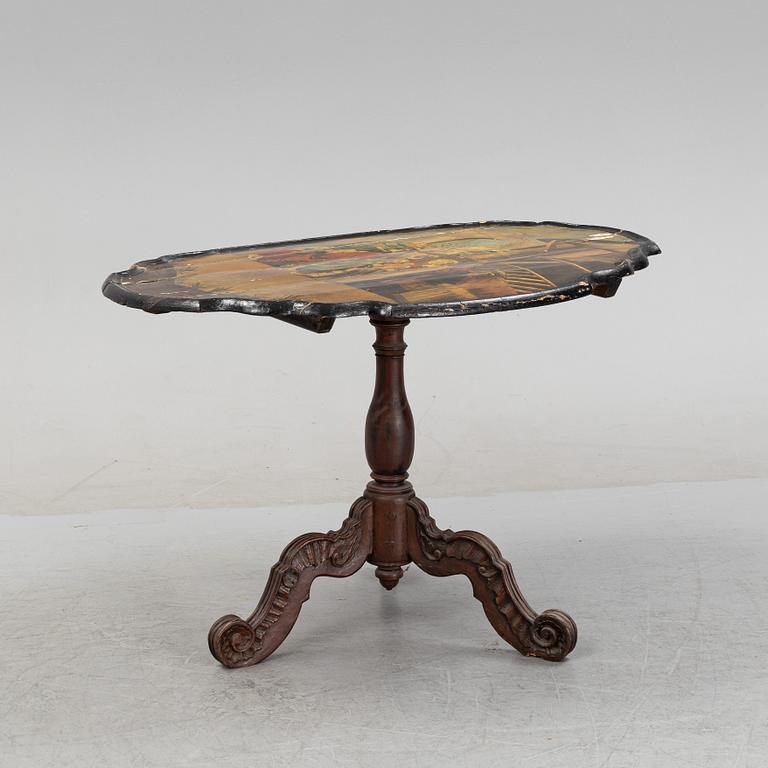 A transitional drop-leaf table, mid 18th Century.