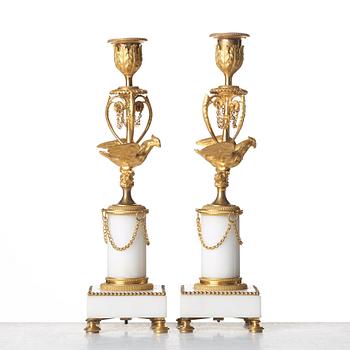 A pair of Louis XVI late 18th century candlesticks.