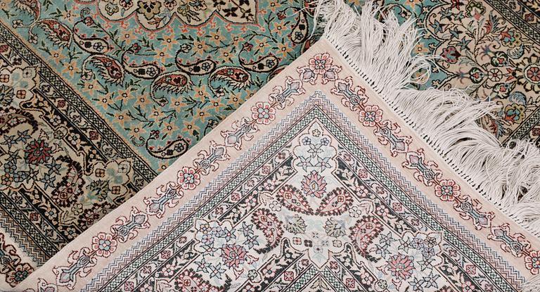 An Oriental silk rug, approx. 154 x 91 cm.