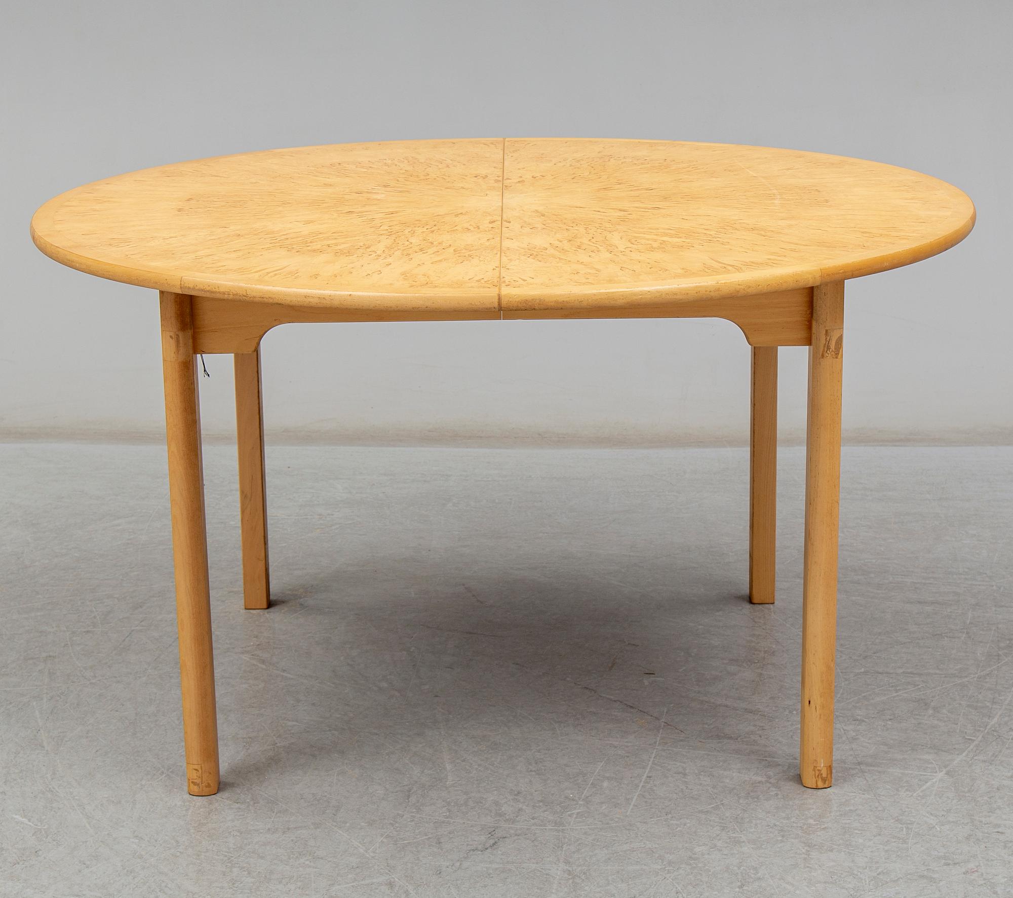 a 'Svitjod' dining table by Göran Malmvall for Karl Andersson & söner.