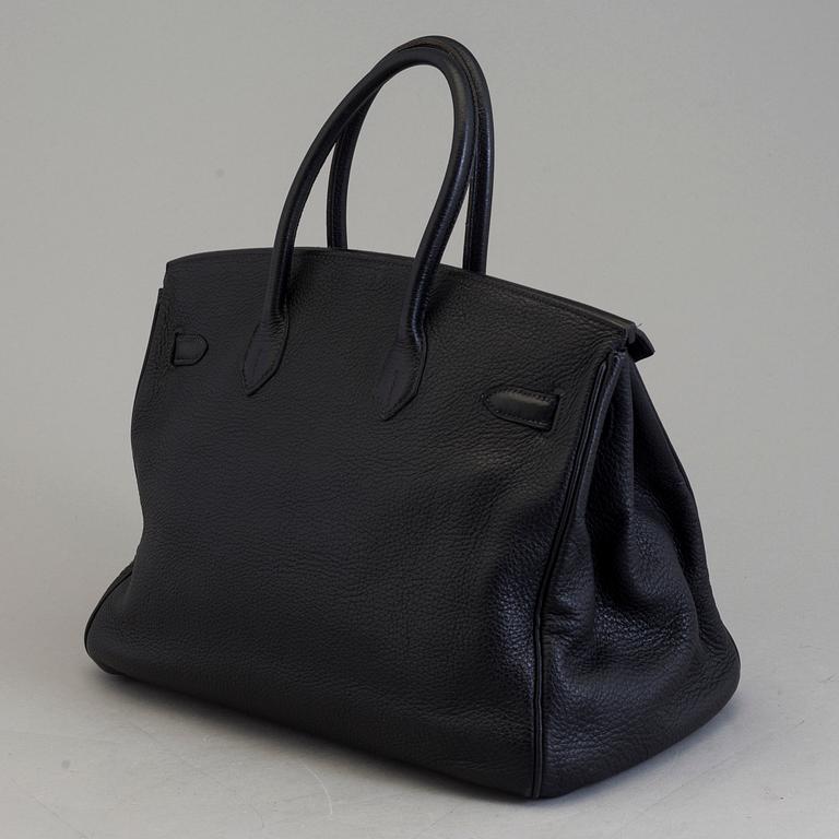 A dark blue togo "Birkin 35" bag by HermÈs from 2009.