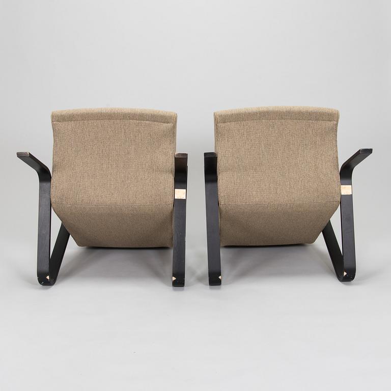 Eero Saarinen,  a pair of 'Grasshopper' armchars manufactured under licens by Tetrimäki Finland 2014.