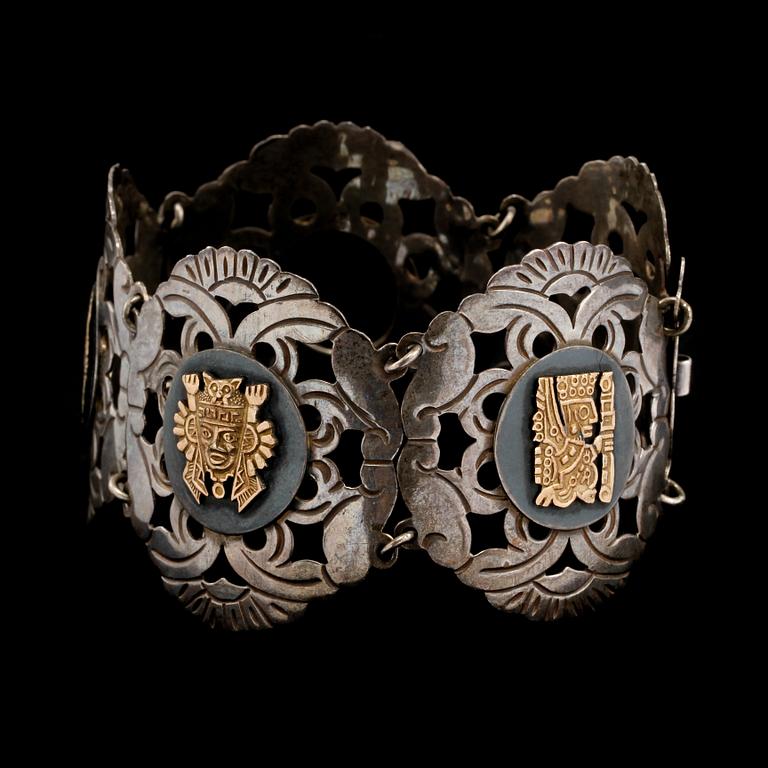 ARMLÄNK, 18k guld och sterlingsilver, Peru. Vikt 48 g.