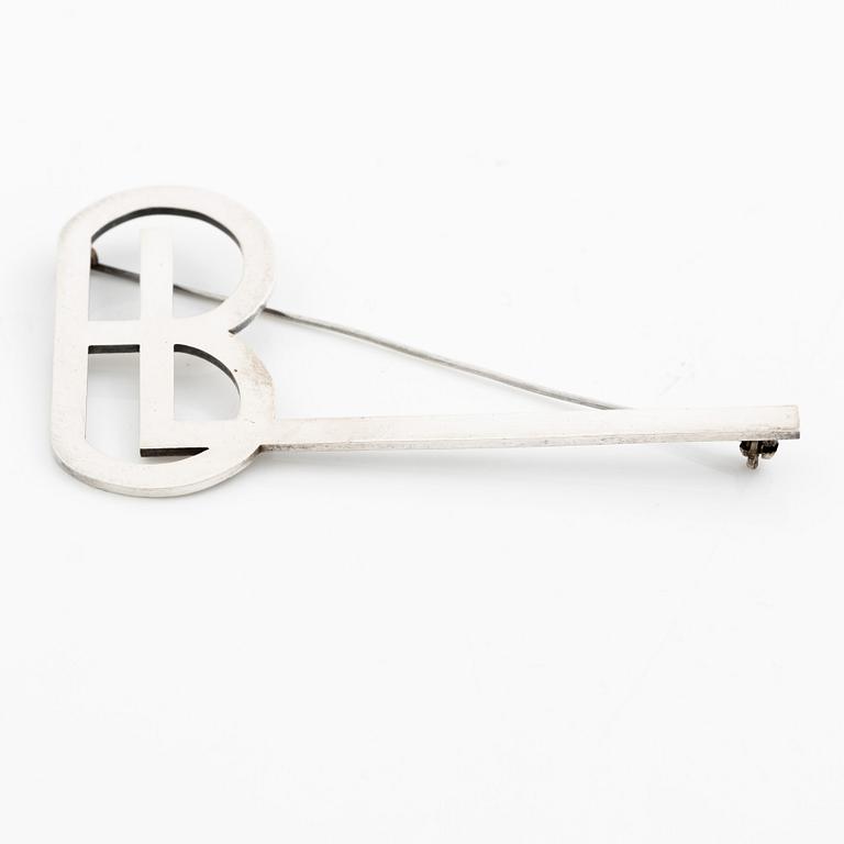 Wiwen Nilsson, a monogram brooch, sterling silver, Lund 1943.